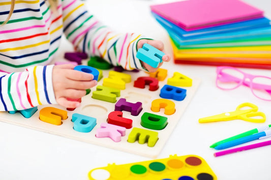 Child playing with alphabet learning game