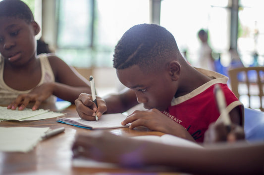 Children practicing handwriting